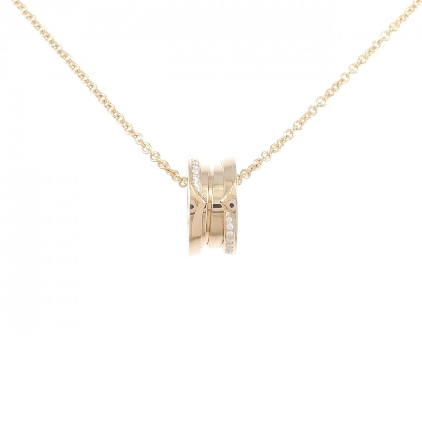 Bvlgari B.zero1 Necklace: Bvlgari B.zero1 Necklace Elevate your style with the Bvlgari B.zero1 Necklace, a stunning piece of pink gold jewelry that exudes luxury and sophistication. This beautiful pendant is set in a delicate