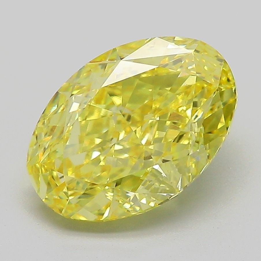 IGI Oval 3.59ct Fancy Vivid Yellow VVS2 Diamond: IGI Oval 3.59ct Fancy Vivid Yellow VVS2 Diamond Experience the vibrant beauty of a lab-grown Fancy Vivid Yellow diamond, certified by IGI and boasting exceptional clarity (VVS2) and polish (EX). With