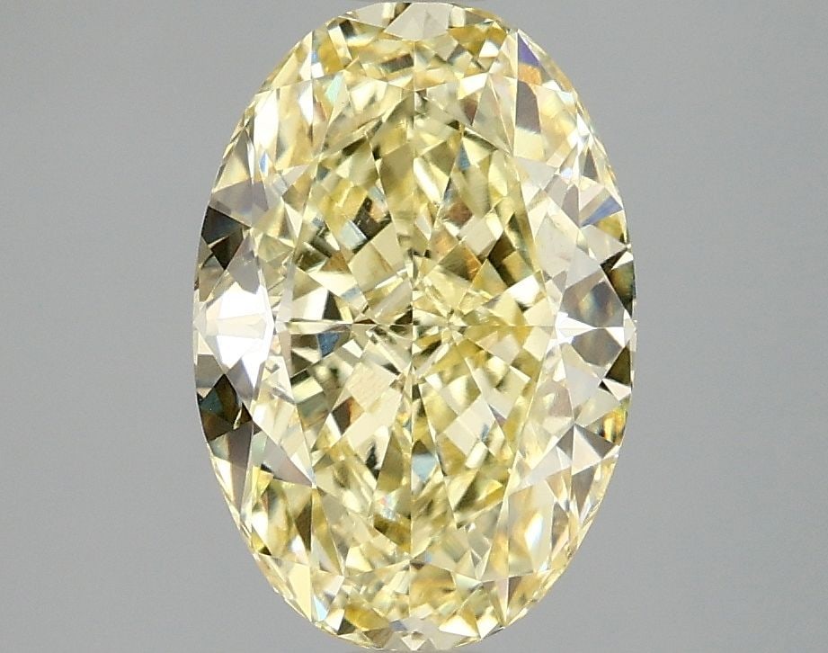 IGI Oval 3.02ct Fancy Intense Yellow VVS2 Loose Lab Diamond: IGI Oval 3.02ct Fancy Intense Yellow VVS2 Loose Lab Diamond Experience the vibrant warmth of a lab-grown Fancy Intense Yellow diamond, boasting exceptional clarity and cut quality in its 3.02ct oval s