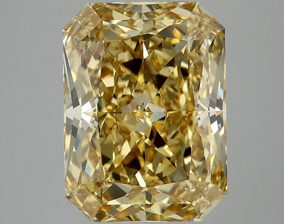 IGI Radiant 4.1ct Fancy Intense Yellow VVS2 Loose Lab Diamond: IGI Radiant 4.1ct Fancy Intense Yellow VVS2 Loose Lab Diamond Experience the vibrant warmth of a genuine lab-grown Fancy Intense Yellow diamond, boasting exceptional clarity and polish in its 4.1ct VV