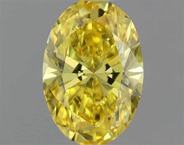 IGI Oval 0.52ct Fancy Vivid Yellow VVS2 Loose Lab Diamond: IGI Oval 0.52ct Fancy Vivid Yellow VVS2 Loose Lab Diamond Experience the brilliance of nature in a lab-grown diamond, certified by the International Gemological Institute (IGI) as Fancy Vivid Yellow