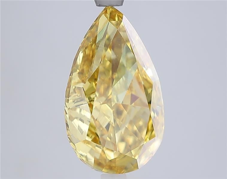 Loose Lab Diamond - IGI Pear 5.0ct Fancy Vivid Yellow VVS2: Loose Lab Diamond - IGI Pear 5.0ct Fancy Vivid Yellow VVS2 A rare and radiant gem, this 5.0ct Fancy Vivid Yellow Lab diamond boasts exceptional clarity (VVS2) and polish (EX), giving it an unmatched b