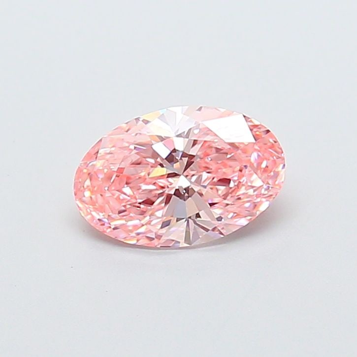 IGI Oval 1.06ct Fancy Vivid Pink VVS2 Loose Lab Diamond: IGI Oval 1.06ct Fancy Vivid Pink VVS2 Loose Lab Diamond Experience the rare beauty of a Fancy Vivid Pink diamond, one of the most coveted colors in the world of gemstones. This stunning 1.06ct lab-gro