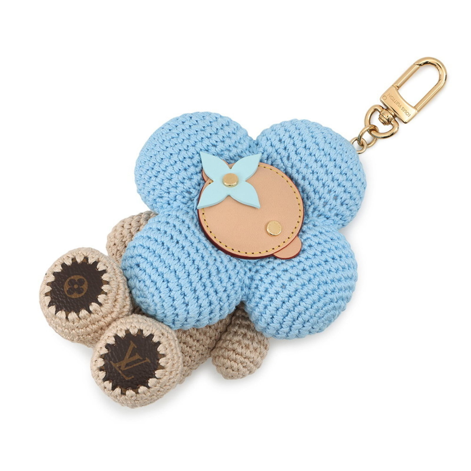 Leather - Louis Vuitton Handbag Charm Cotton: Leather - Louis Vuitton Handbag Charm Cotton Add a touch of timeless elegance to your handbag collection with this exquisite Louis Vuitton charm, crafted from luxurious leather and adorned with the ic