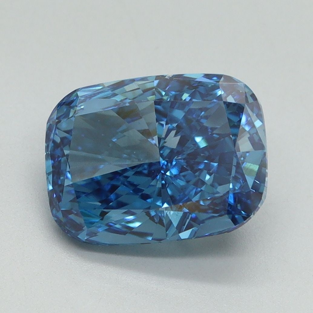 Loose Lab Diamond - IGI Cushion Brilliant 3.01ct Fancy Vivid Blue VVS2: Loose Lab Diamond - IGI Cushion Brilliant 3.01ct Fancy Vivid Blue VVS2 Experience the rare beauty of a Fancy Vivid Blue lab diamond, boasting exceptional clarity and polish. This stunning 3.01ct cushi