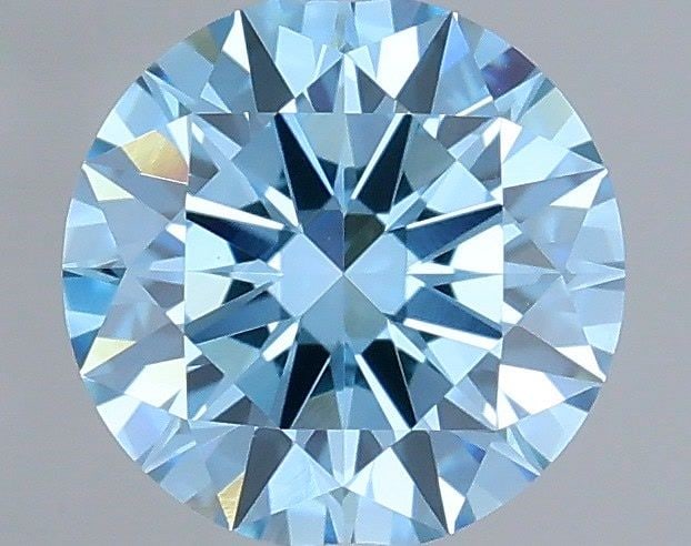 IGI Round 0.55ct Fancy Vivid Blue VVS2 Loose Lab Diamond: IGI Round 0.55ct Fancy Vivid Blue VVS2 Loose Lab Diamond Experience the breathtaking beauty of a Fancy Vivid Blue diamond, one of the rarest and most coveted colors in nature. This exquisite 0.55ct
