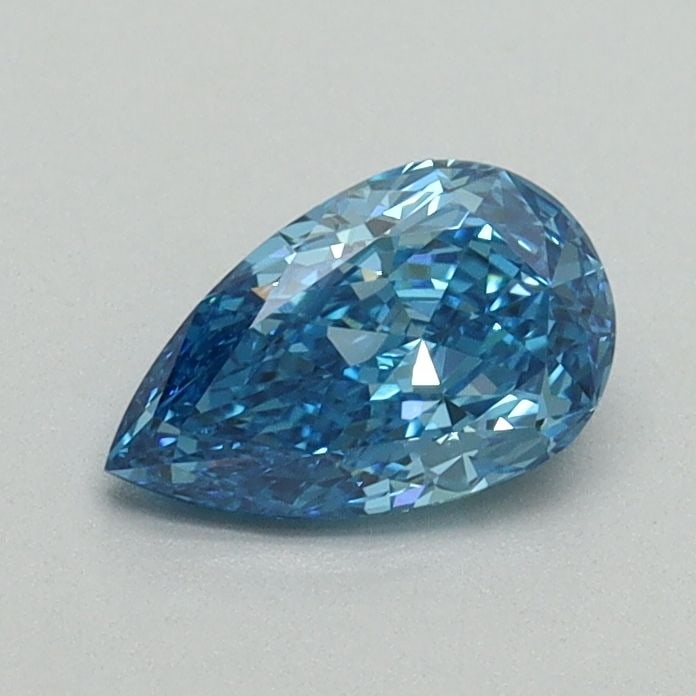 Loose Lab Diamond - IGI Pear 0.59ct Fancy Vivid Blue VVS2: Loose Lab Diamond - IGI Pear 0.59ct Fancy Vivid Blue VVS2 Experience the breathtaking beauty of a lab-grown diamond, certified by the International Gemological Institute (IGI) as Fancy Vivid Blue,