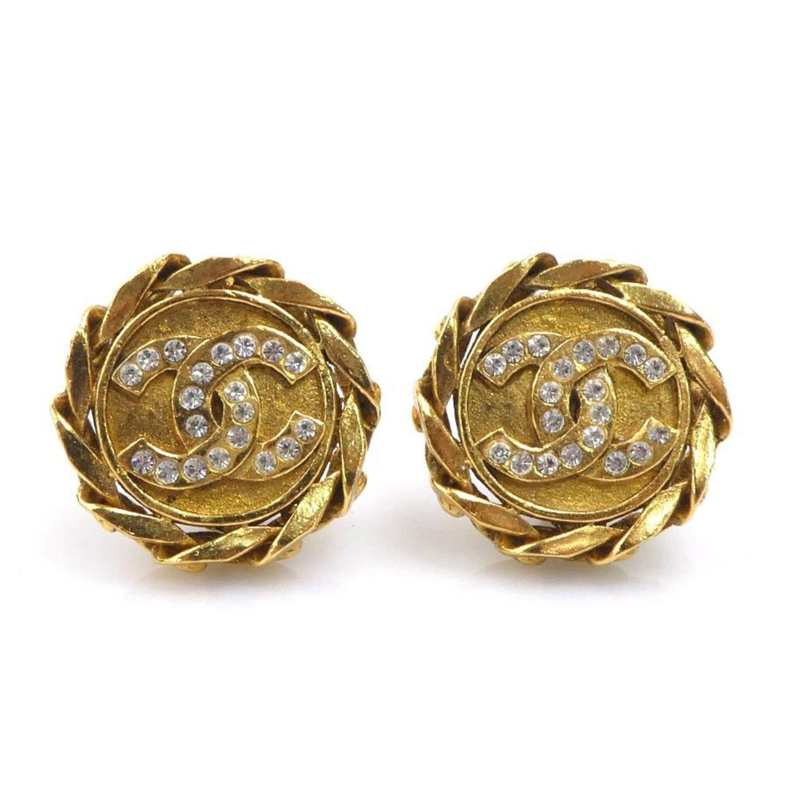 Rhinestone - Chanel Clip Earrings Metal: Rhinestone - Chanel Clip Earrings Metal Add a touch of luxury to your everyday look with these stunning Chanel clip earrings, adorned with intricate rhinestones in gold metal. With their sleek design