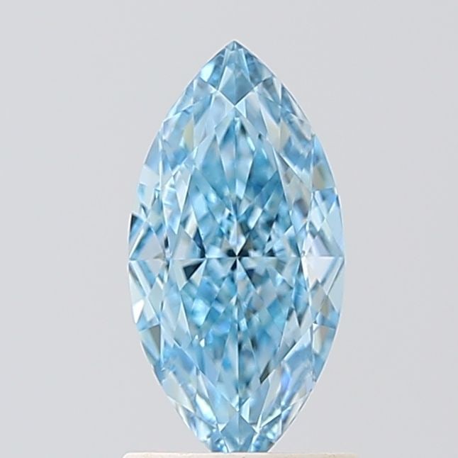 IGI Marquise 1.28ct Fancy Vivid Blue VVS2 Loose Lab Diamond: IGI Marquise 1.28ct Fancy Vivid Blue VVS2 Loose Lab Diamond Experience the rare beauty of a Fancy Vivid Blue diamond, one of the world's most elusive and coveted colors. This stunning 1.28ct