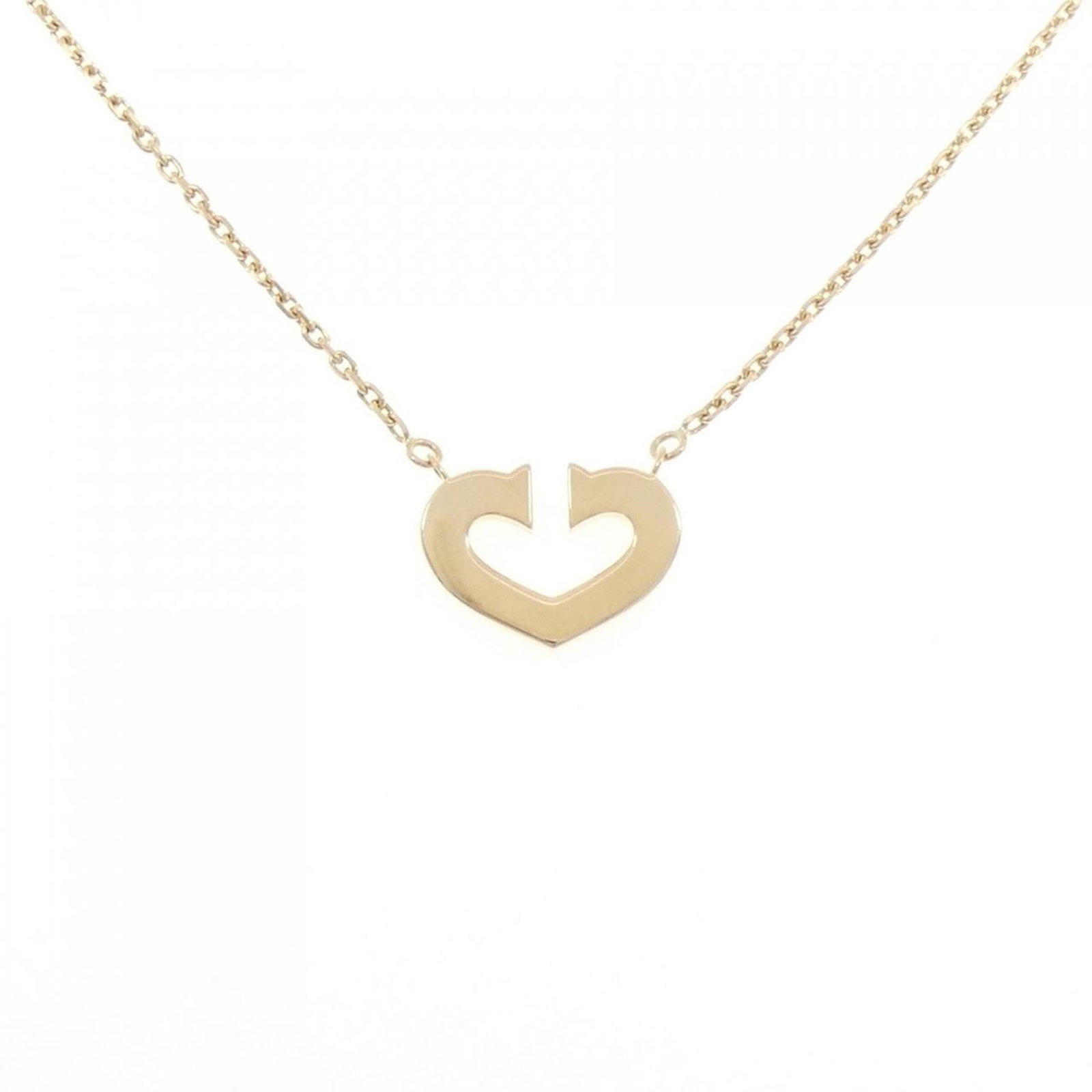 Cartier C-Heart Necklace: Cartier C-Heart Necklace A stunning Cartier C-Heart Necklace in 18K yellow gold, this iconic piece exudes timeless elegance with its sleek design and delicate pendant. With a subtle 12.1mm x 16.5mm pe