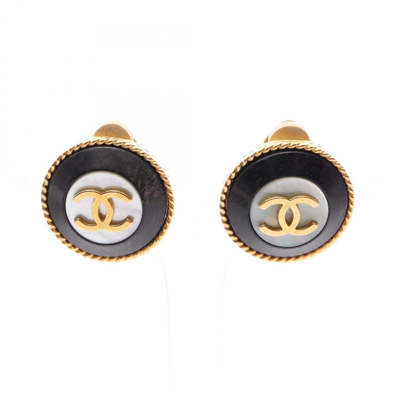 Plastic - Chanel Clip Earrings Gold Plating: Plastic - Chanel Clip Earrings Gold Plating Elevate your everyday look with these stunning Chanel clip earrings, boasting sleek gold plating and a chic black finish. Made from durable plastic and ador