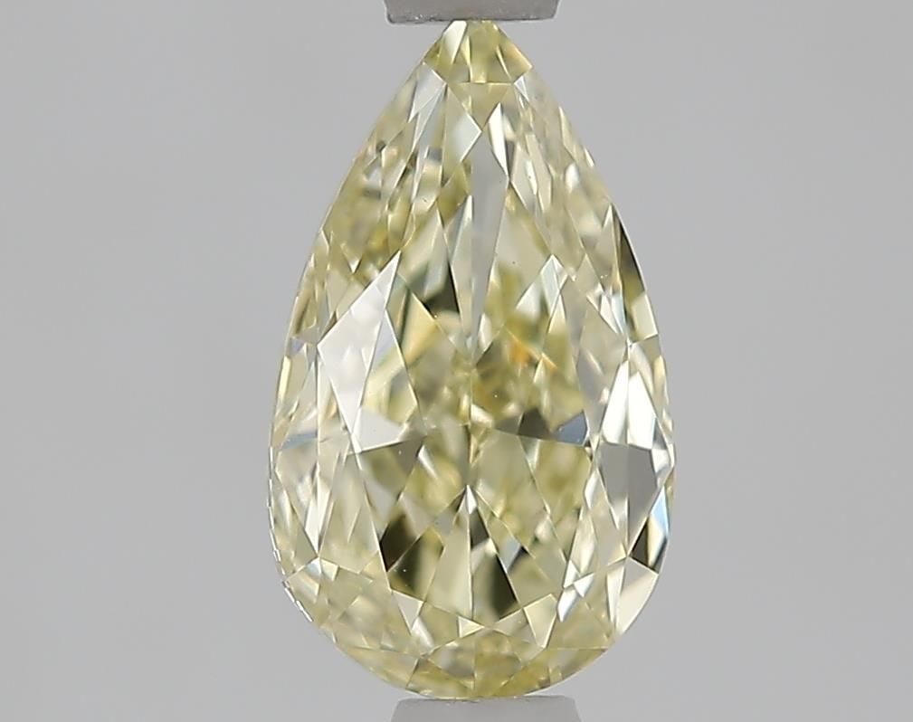 Loose Lab Diamond - IGI Pear 1.05ct Fancy Yellow VVS2: Loose Lab Diamond - IGI Pear 1.05ct Fancy Yellow VVS2 Experience the beauty of a lab-grown diamond, certified by IGI as Fancy Yellow with exceptional clarity and cut. This 1.05ct pear-shaped gemstone