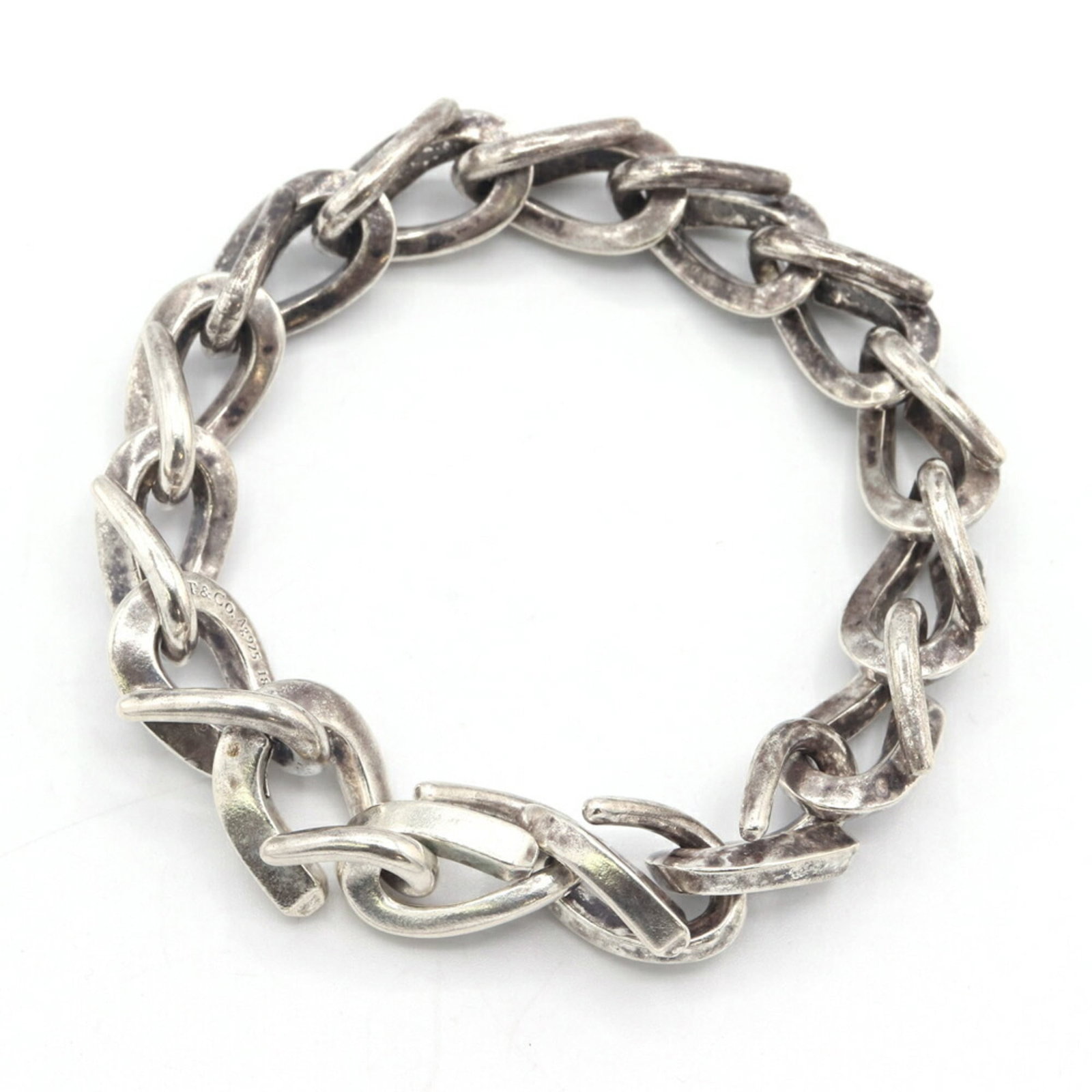 925 Tiffany Charm Bracelet Silver: 925 Tiffany Charm Bracelet Silver A beautiful 925 Tiffany charm bracelet, crafted from sterling silver and available in both men's and women's sizes, offers a timeless and elegant accessory for everyd