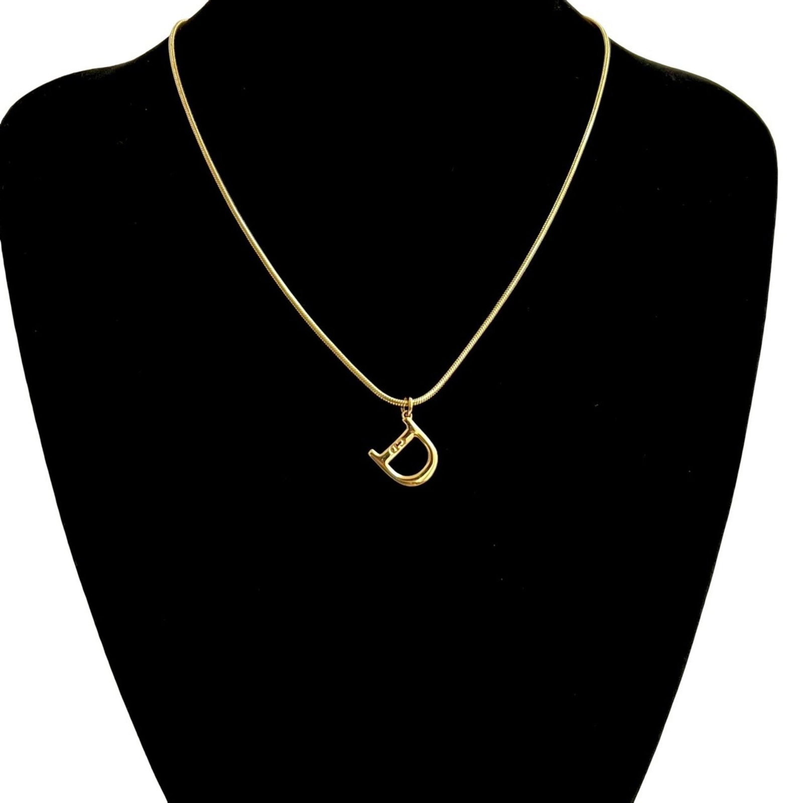 Christian Dior CD Logo GP Gold Necklace Pendant Choker: Christian Dior CD Logo GP Gold Necklace Pendant Choker Elevate your style with the iconic Christian Dior CD Logo GP Gold Necklace Pendant Choker, a timeless piece of luxury jewelry that exudes sophist