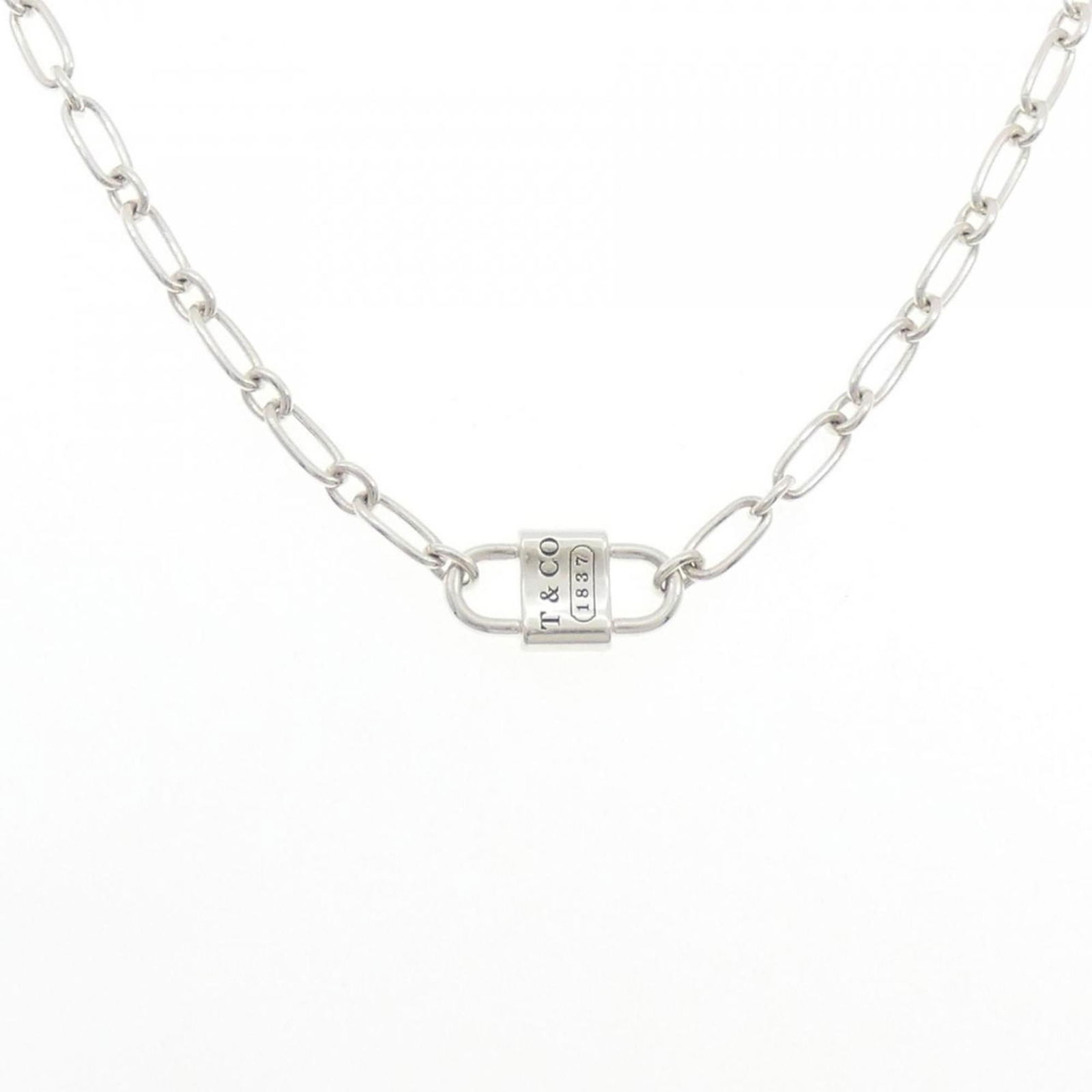 Necklace Tiffany 1837 Small Double Lock: Necklace Tiffany 1837 Small Double Lock A stunning piece of Tiffany history, the 1837 Small Double Lock necklace is a timeless treasure for any woman who appreciates classic elegance. This beautifully
