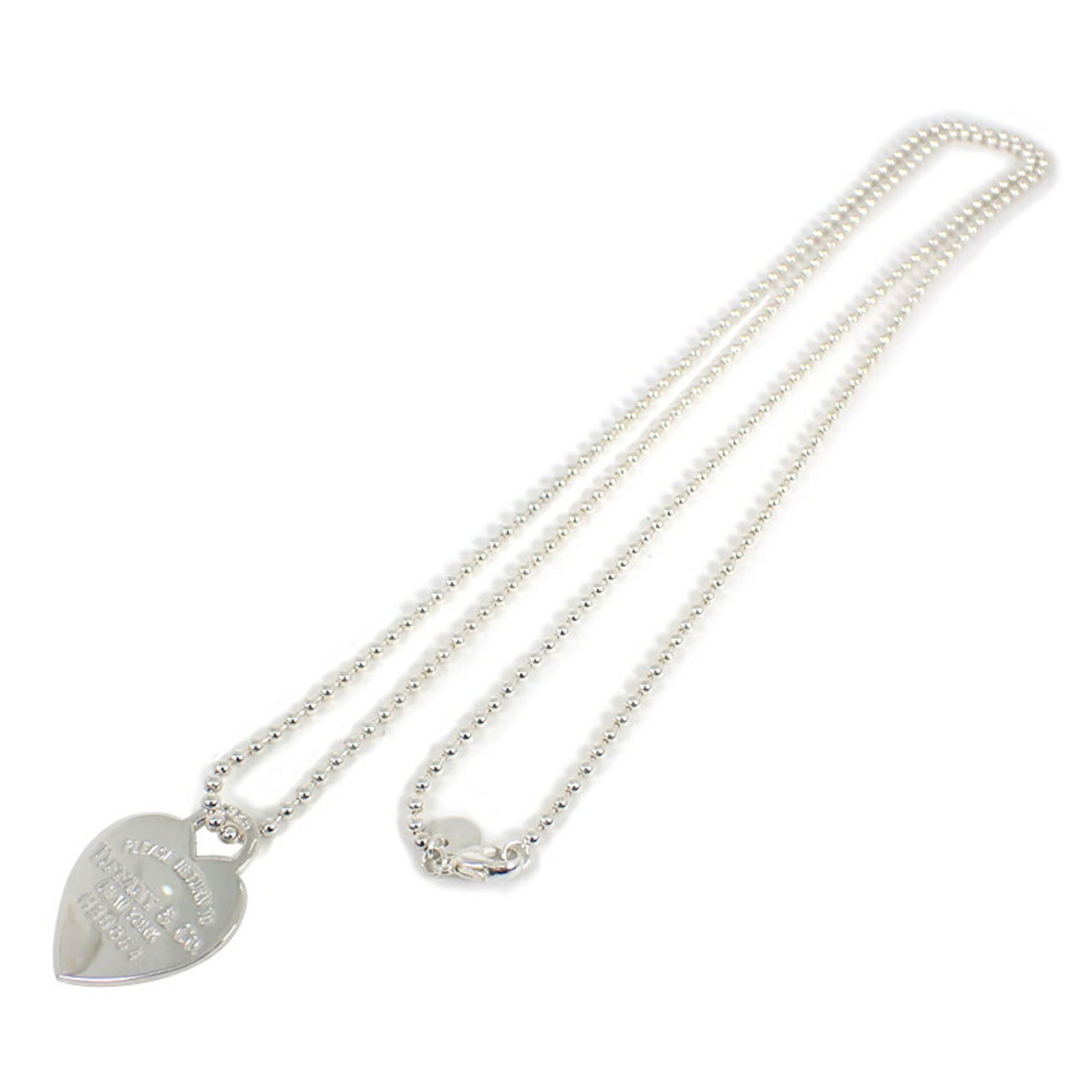 Return to Tiffany 925 Heart Necklace: Return to Tiffany 925 Heart Necklace A timeless symbol of elegance, the Return to Tiffany 925 Heart Necklace is a sterling silver masterpiece that exudes sophistication and refinement. With its classi