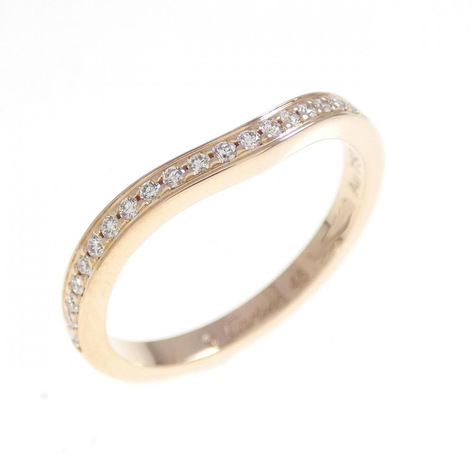 Pink Gold 18k Cartier Band Ring: Pink Gold 18k Cartier Band Ring A stunning pink gold Cartier band ring, adorned with a diamond, adds a touch of elegance to any outfit. This 18k pink gold masterpiece is in excellent condition, with o