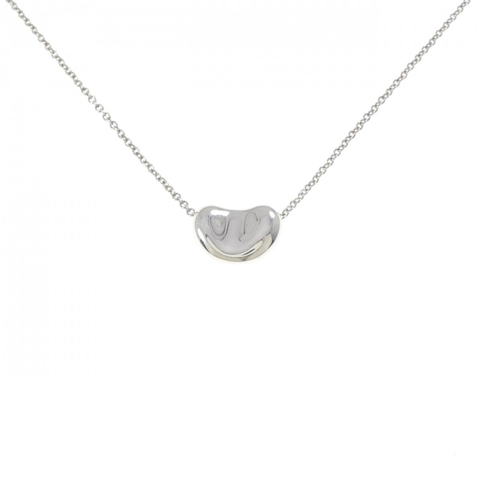 Necklace Tiffany Beans: Necklace Tiffany Beans A delicate and elegant silver necklace, the Tiffany Beans pendant shines with subtle sophistication. Made from high-quality 925 sterling silver, this beautiful piece boasts a cl