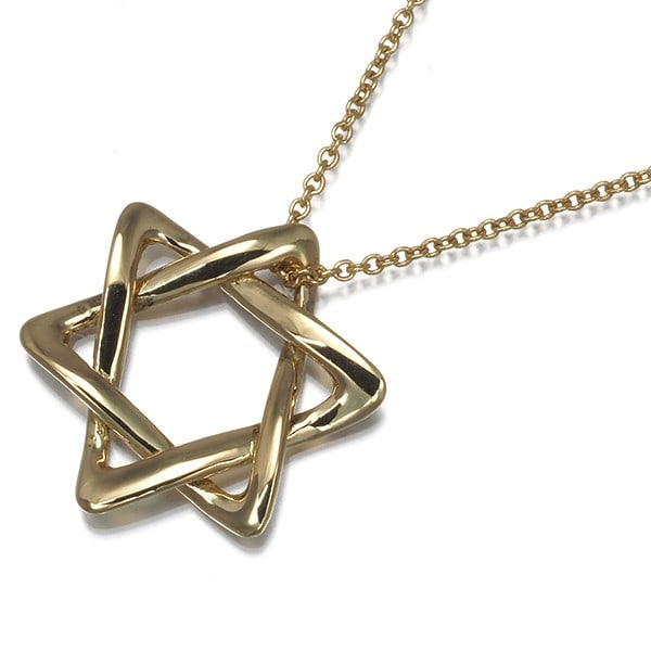 Tiffany & Co. Star of David 18k Yellow Gold Necklace: Tiffany & Co. Star of David 18k Yellow Gold Necklace Elegant and understated, the Tiffany & Co. Star of David 18k Yellow Gold Necklace is a masterful blend of classic design and subtle sophistication.