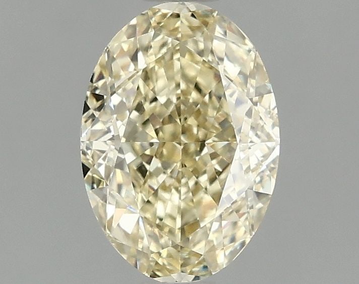 IGI Oval 1.54ct Fancy Vivid Yellow VVS2 Loose Lab Diamond: IGI Oval 1.54ct Fancy Vivid Yellow VVS2 Loose Lab Diamond Experience the brilliance of nature in a lab-grown diamond, certified by IGI as a Fancy Vivid Yellow VVS2, boasting exceptional clarity and cu