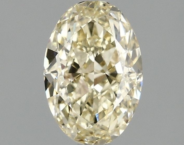 IGI Oval 1.5ct Fancy Yellow VVS2 Loose Lab Diamond: IGI Oval 1.5ct Fancy Yellow VVS2 Loose Lab Diamond A rare and vibrant Fancy Yellow diamond, certified by the International Gemological Institute (IGI), boasts exceptional clarity and cut quality with