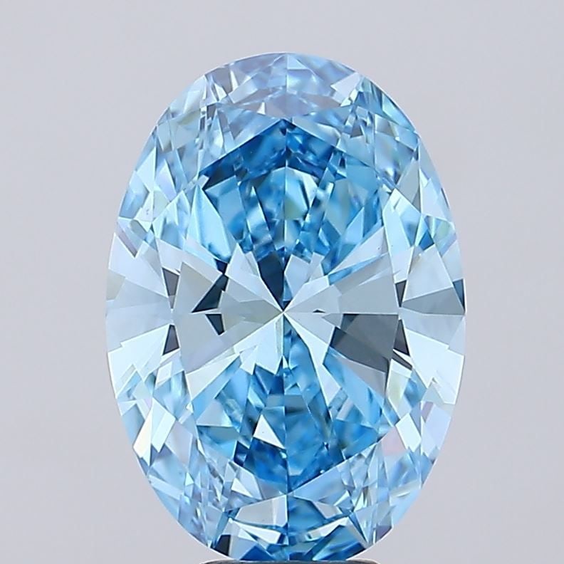 IGI Oval 7.01ct Fancy Vivid Blue VVS2 Loose Lab Diamond: IGI Oval 7.01ct Fancy Vivid Blue VVS2 Loose Lab Diamond Experience the rare beauty of a Fancy Vivid Blue diamond, one of the most elusive and coveted colors in nature. This stunning 7.01ct lab-grown