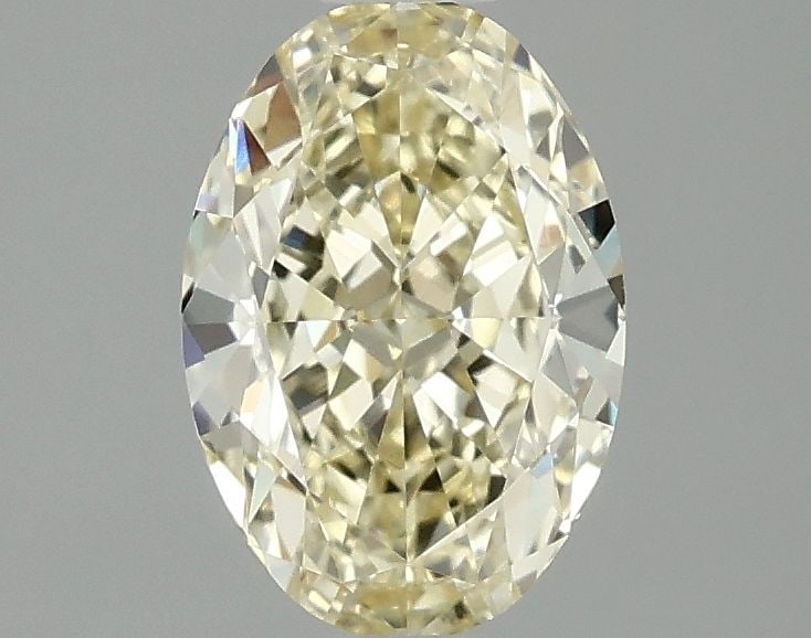 IGI Oval 1.59ct Fancy Intense Yellow VVS2 Loose Lab Diamond: IGI Oval 1.59ct Fancy Intense Yellow VVS2 Loose Lab Diamond Experience the vibrant beauty of nature in this exceptional 1.59ct Fancy Intense Yellow VVS2 loose lab diamond, certified by IGI and