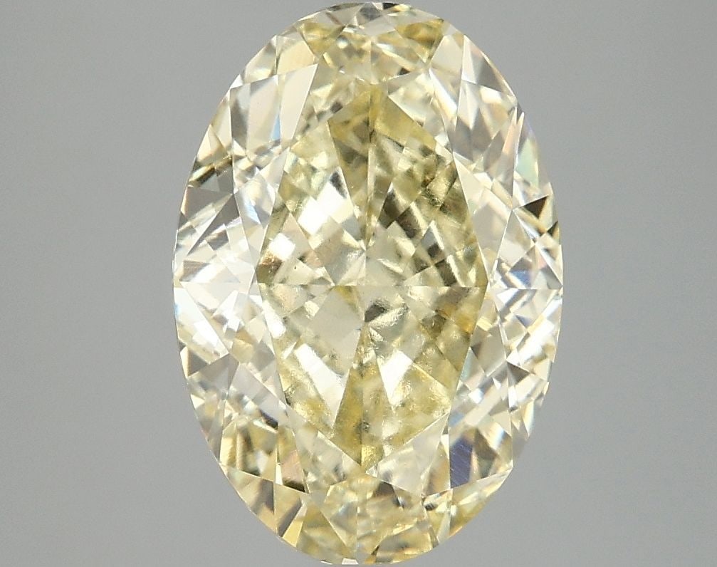 IGI Oval 4.07ct Fancy Intense Yellow VVS2 Loose Lab Diamond: IGI Oval 4.07ct Fancy Intense Yellow VVS2 Loose Lab Diamond Experience the vibrant beauty of nature in this stunning 4.07ct Fancy Intense Yellow VVS2 lab-grown diamond, certified by the International