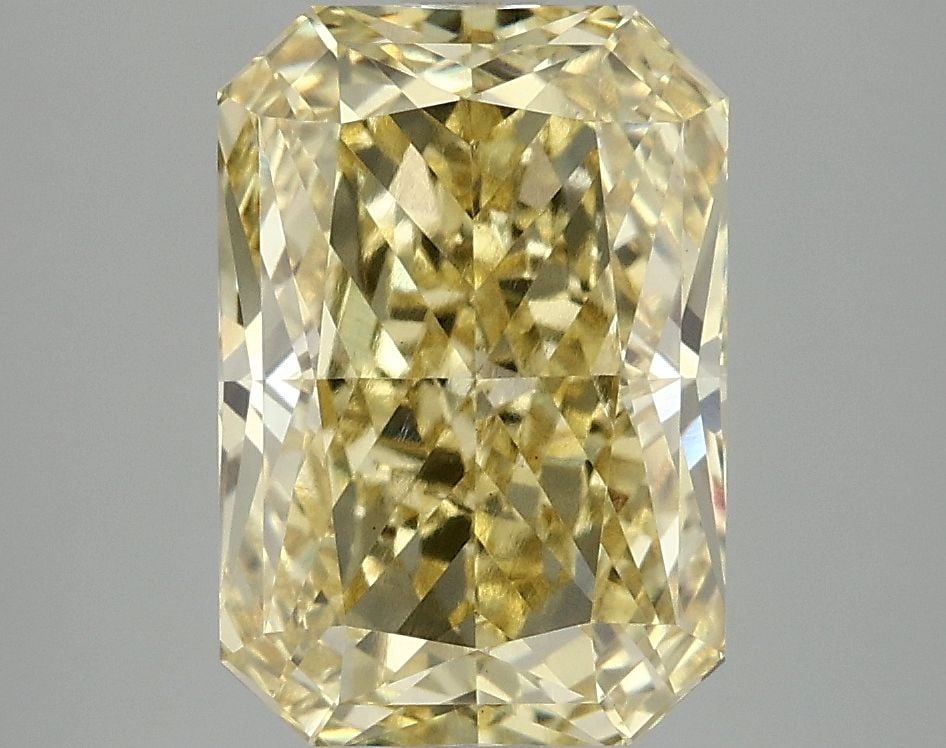 IGI Radiant 4.06ct Fancy Vivid Yellow VVS2 Loose Lab Diamond: IGI Radiant 4.06ct Fancy Vivid Yellow VVS2 Loose Lab Diamond Experience the brilliance of nature's own sunshine with this stunning 4.06ct Fancy Vivid Yellow VVS2 loose lab diamond, certified by IGI