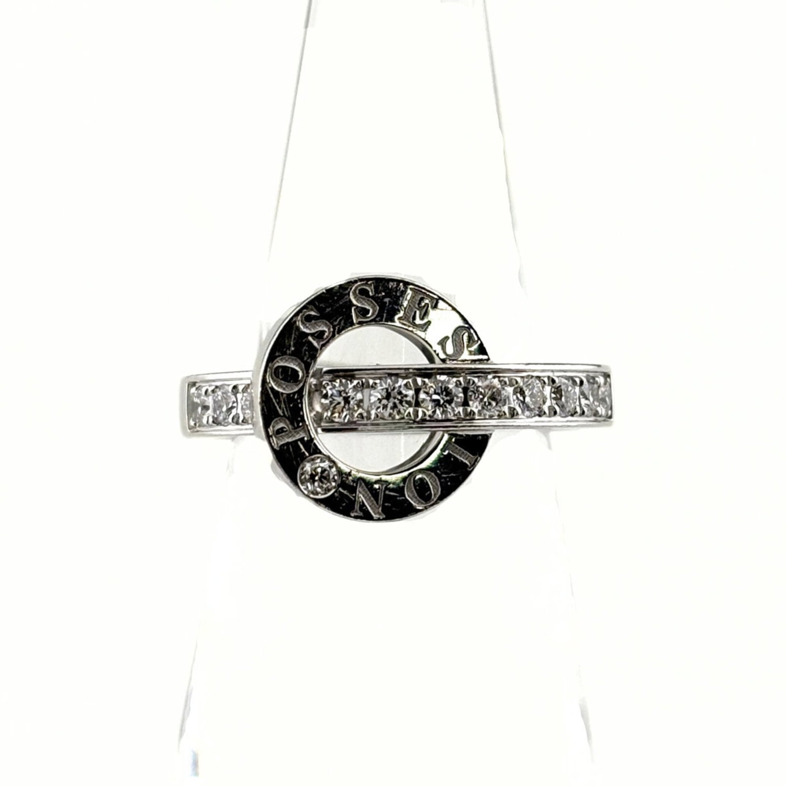 White Gold Piaget Band Ring: White Gold Piaget Band Ring A stunning white gold band ring from Piaget, this beautiful piece boasts sleek lines and a sophisticated design that exudes elegance. With its high-quality white gold mater