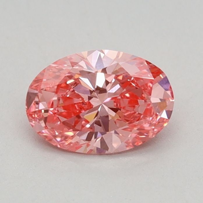 IGI Oval 0.43ct Fancy Vivid Pink VVS2 Loose Lab Diamond: IGI Oval 0.43ct Fancy Vivid Pink VVS2 Loose Lab Diamond Experience the breathtaking beauty of a lab-grown Fancy Vivid Pink diamond, certified by the International Gemological Institute (IGI). This