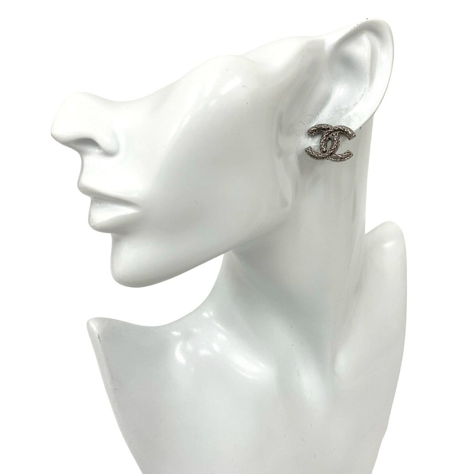 Chanel alloy stud earrings: Chanel alloy stud earrings Elevate your everyday style with these iconic Chanel alloy stud earrings, boasting sleek silver tones and timeless design that exudes luxury. With their 14mm diameter and su