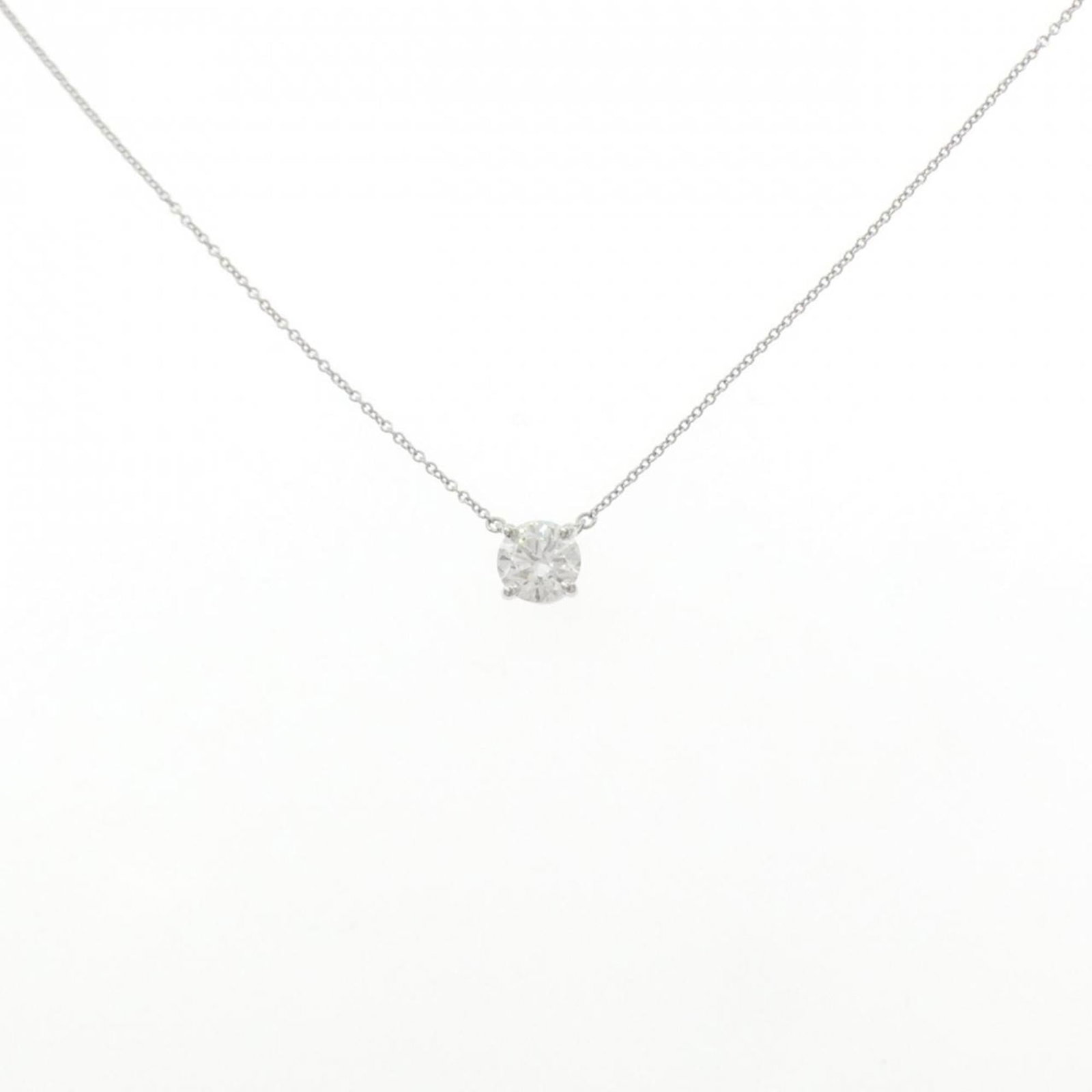 3EXT Tiffany Solitaire Necklace 1.13CT F VVS1: 3EXT Tiffany Solitaire Necklace 1.13CT F VVS1 Experience the timeless elegance of Tiffany & Co.'s iconic Solitaire necklace, boasting a stunning 1.13ct F VVS1 diamond set in platinum. This exquisite p