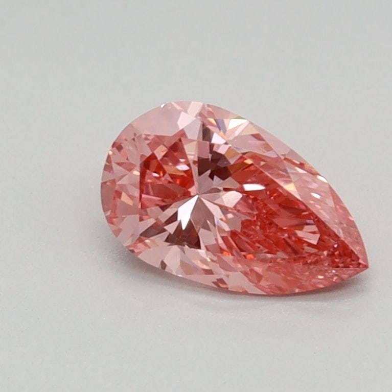 Loose Lab Diamond - IGI Pear 0.44ct Fancy Vivid Pink VVS2: Loose Lab Diamond - IGI Pear 0.44ct Fancy Vivid Pink VVS2 Experience the rare beauty of a lab-grown diamond, expertly certified by the International Gemological Institute (IGI) as Fancy Vivid Pink in