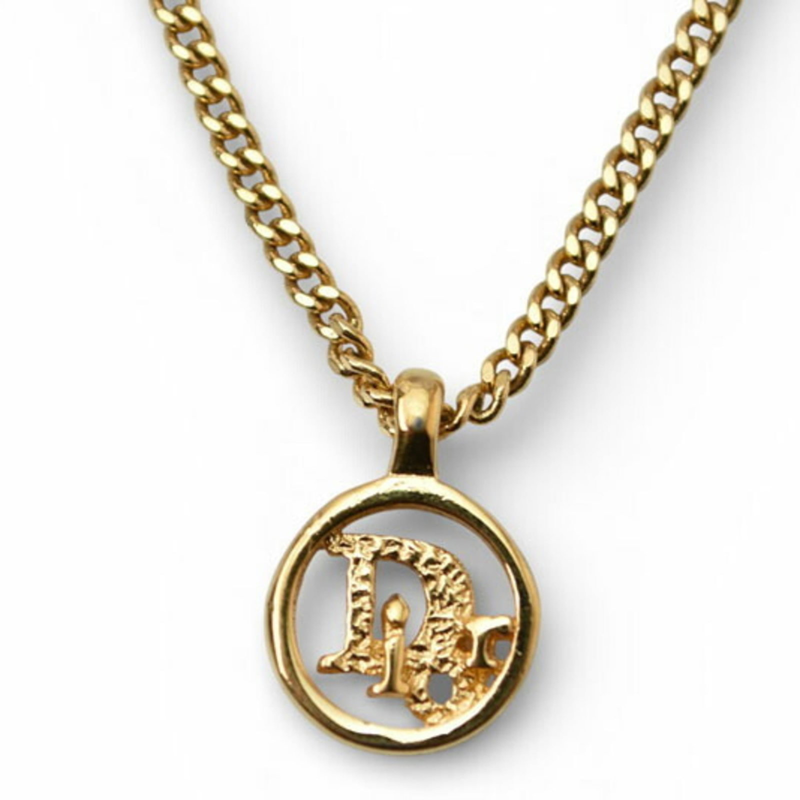 Christian Dior Circle Gold Necklace: Christian Dior Circle Gold Necklace Elevate your style with the timeless elegance of Christian Dior's Circle Gold Necklace, boasting 18k gold plating and a sleek, modern design that suits both men and