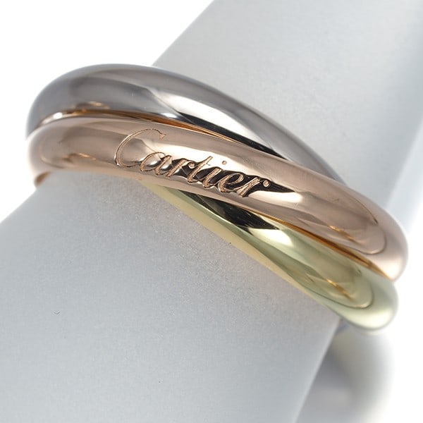 Gold Cartier Ring Trinity 3Color Classic Eu59 18K 750 Yellow White Rose: Gold Cartier Ring Trinity 3Color Classic Eu59 18K 750 Yellow White Rose A stunning Cartier Trinity ring in 18k multi-tone gold, expertly crafted with a classic design that exudes timeless elegance. Th
