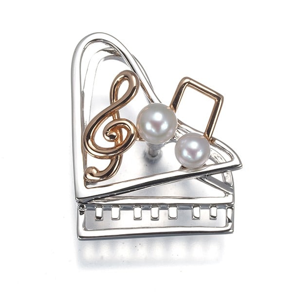 Gold Mikimoto Brooch Akoya Pearl 3.4Mm/ 3.9Mm Piano Rose: Gold Mikimoto Brooch Akoya Pearl 3.4Mm/ 3.9Mm Piano Rose A stunning 18k pink gold brooch from renowned Japanese jeweler Mikimoto, showcasing two exquisite Akoya pearls in piano rose shape, measuring 3
