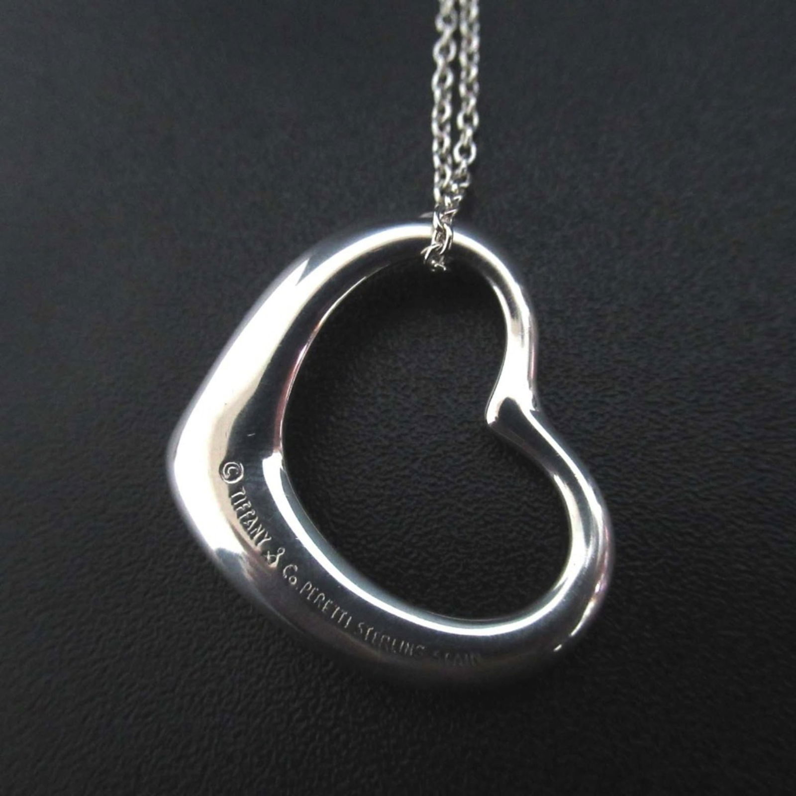 Tiffany & Co. Elsa Peretti Open Heart 925 SV Silver Pendant for Women: Tiffany & Co. Elsa Peretti Open Heart 925 SV Silver Pendant for Women Elegance and sophistication come together in this stunning Tiffany & Co. Elsa Peretti Open Heart 925 SV Silver Pendant, perfect fo