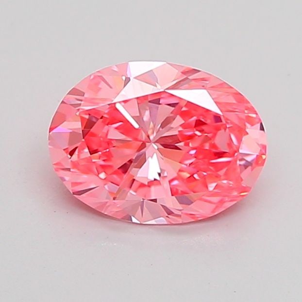 IGI Oval 1.03ct Fancy Vivid Pink VVS2 Loose Lab Diamond: IGI Oval 1.03ct Fancy Vivid Pink VVS2 Loose Lab Diamond Experience the rare beauty of a Fancy Vivid Pink diamond, one of the most coveted colors in the world of gemstones. This stunning 1.03ct