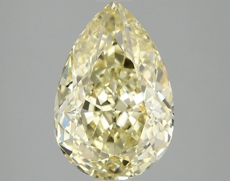 Loose Lab Diamond - IGI Pear 3.06ct Fancy Vivid Yellow VVS2: Loose Lab Diamond - IGI Pear 3.06ct Fancy Vivid Yellow VVS2 Experience the brilliance of nature, reimagined in a lab-grown diamond that rivals its mined counterpart. This stunning 3.06ct Fancy Vivid Y