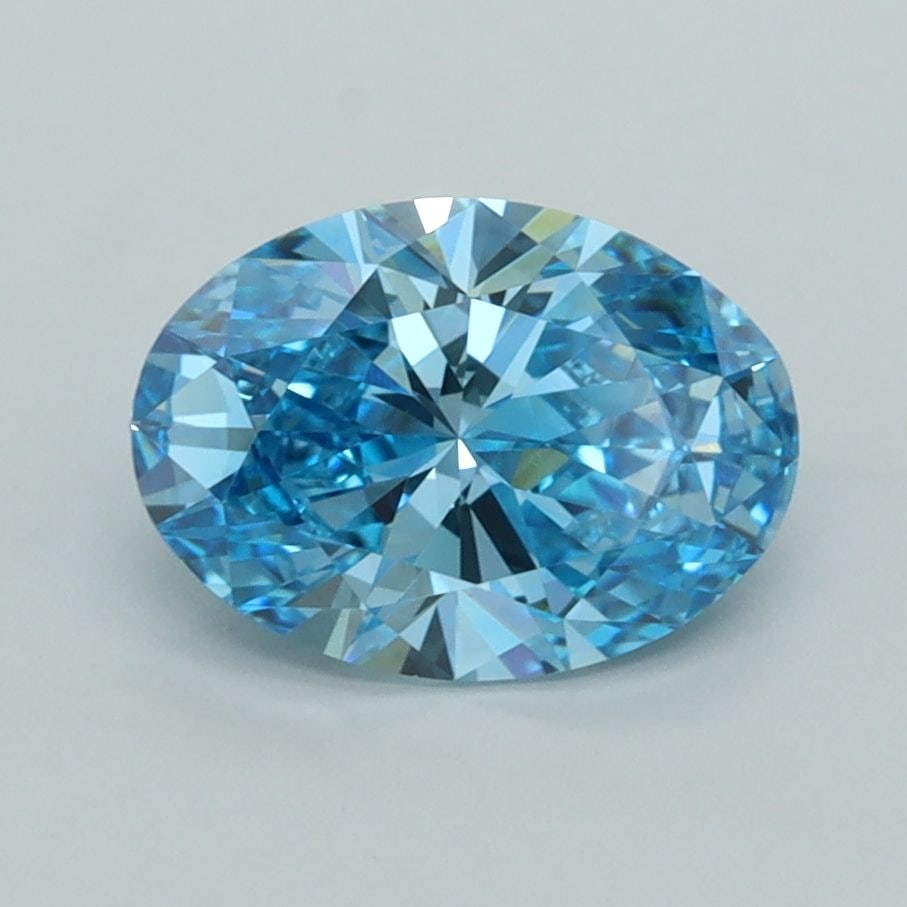 IGI Oval 1.56ct Fancy Vivid Blue VVS2 Loose Lab Diamond: IGI Oval 1.56ct Fancy Vivid Blue VVS2 Loose Lab Diamond Experience the rare beauty of a Fancy Vivid Blue diamond, one of the most elusive and coveted colors in nature. This stunning 1.56ct lab-grown