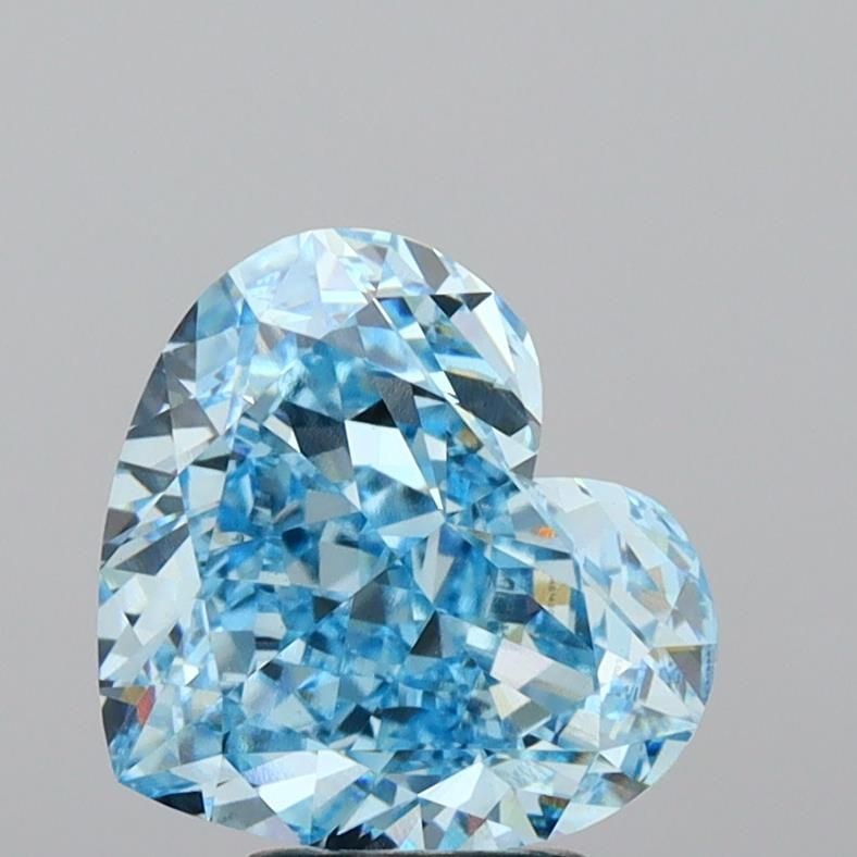 Loose Lab Diamond - IGI Heart 5.13ct Fancy Vivid Blue VVS2: Loose Lab Diamond - IGI Heart 5.13ct Fancy Vivid Blue VVS2 Experience the unparalleled beauty of a lab-grown diamond, certified by the International Gemological Institute (IGI) as Fancy Vivid Blue