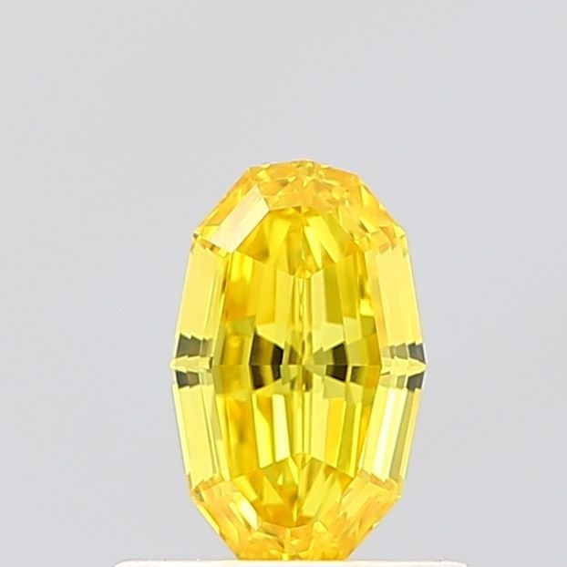IGI Oval 0.58ct Fancy Vivid Yellow VVS1 Loose Lab Diamond: IGI Oval 0.58ct Fancy Vivid Yellow VVS1 Loose Lab Diamond Experience the exceptional beauty of this 0.58ct Fancy Vivid Yellow VVS1 loose lab diamond, certified by the International Gemological Institu