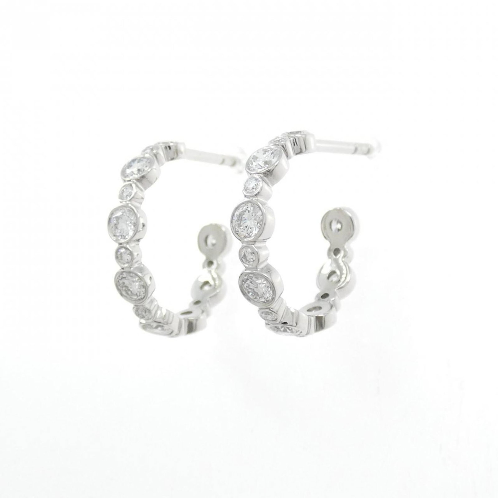 Tiffany Stud Earrings in Platinum 950: Tiffany Stud Earrings in Platinum 950 Elevate your elegance with these stunning Tiffany stud earrings, crafted from luxurious platinum 950 and adorned with a sparkling diamond. The sleek design and ex