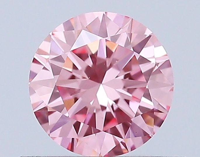 IGI Round 0.51ct Fancy Vivid Pink VVS2 Loose Lab Diamond: IGI Round 0.51ct Fancy Vivid Pink VVS2 Loose Lab Diamond Experience the beauty of lab-grown luxury with this stunning 0.51ct Fancy Vivid Pink VVS2 diamond, boasting exceptional clarity and color. Its