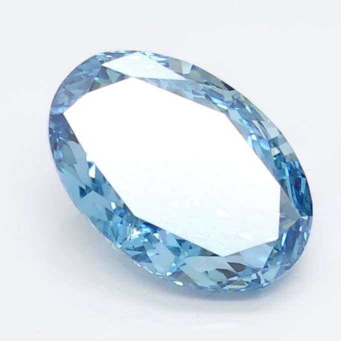 IGI Oval 1.8ct Fancy Vivid Blue VVS2 Loose Lab Diamond: IGI Oval 1.8ct Fancy Vivid Blue VVS2 Loose Lab Diamond Experience the rare beauty of a Fancy Vivid Blue lab diamond, certified by the International Gemological Institute (IGI) as VVS2 in clarity and