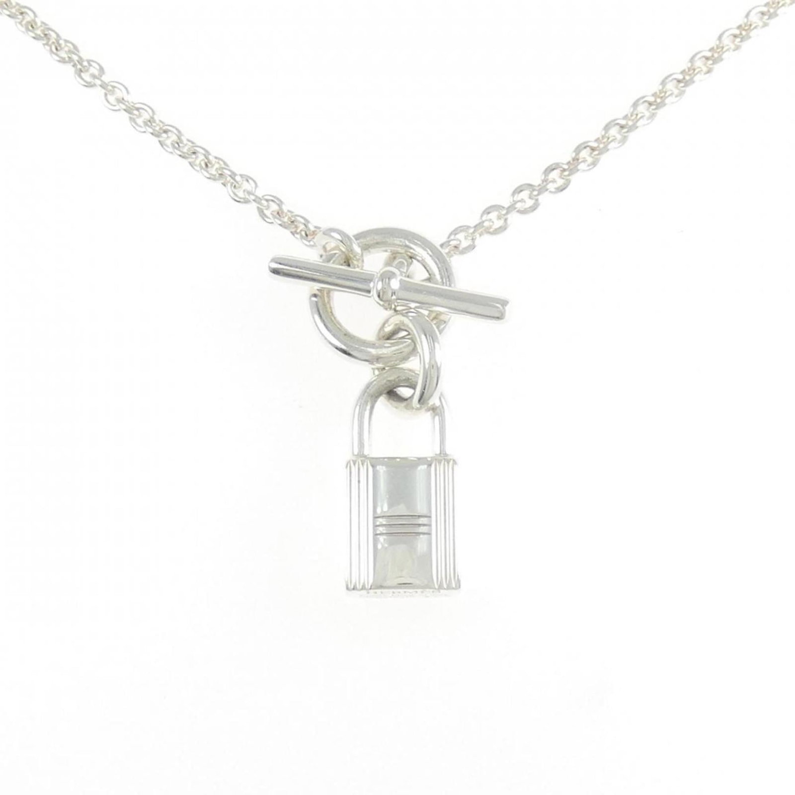Hermes Cadena Amulet Necklace: Hermes Cadena Amulet Necklace Elevate your style with the iconic Hermes Cadena Amulet Necklace, crafted from sterling silver 925 and boasting a sleek, modern design. This timeless piece boasts a