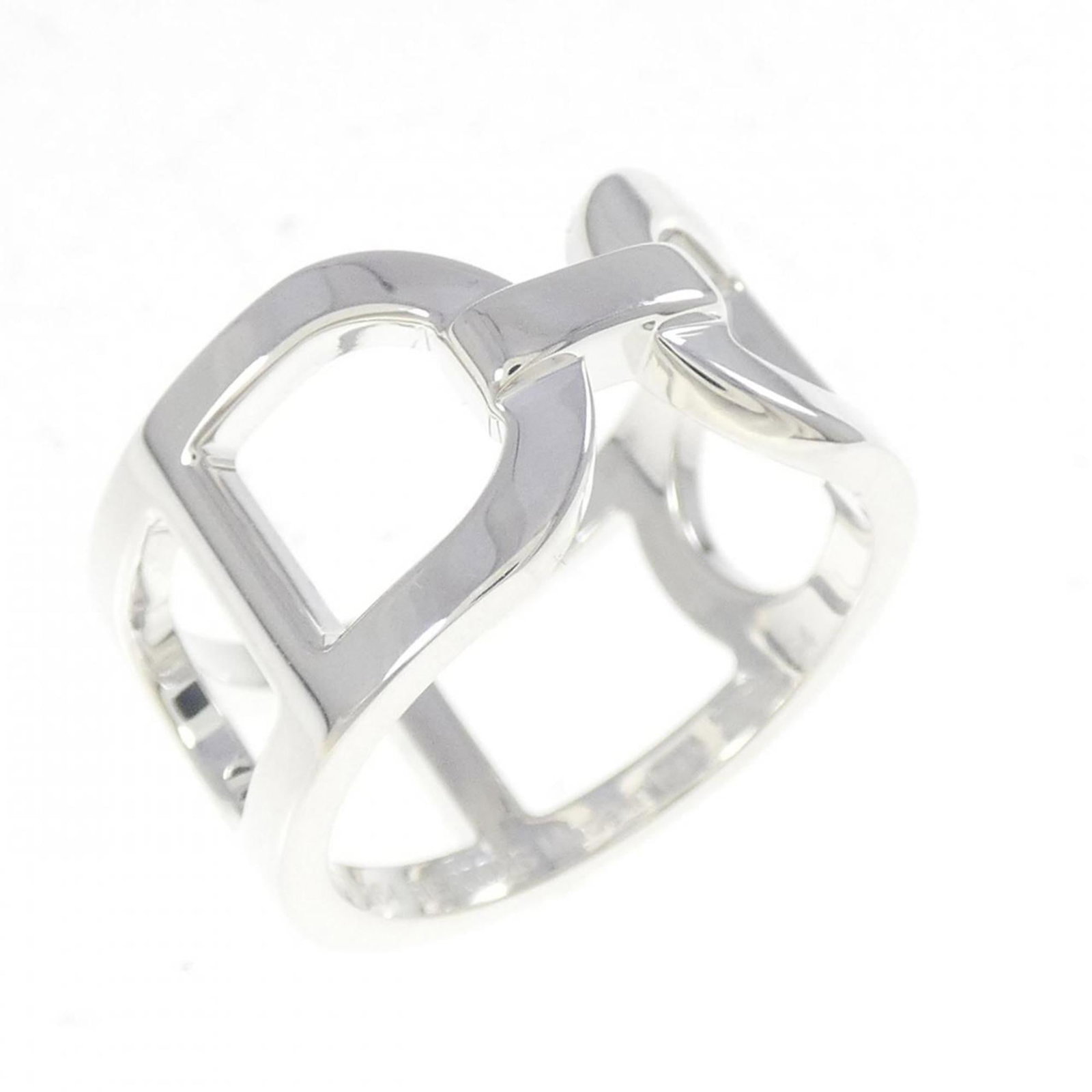 Ring Hermes Band: Ring Hermes Band A stunning silver band ring from the iconic French fashion house Hermes, with a sleek 10.7mm width and comfortable US size 7 fit. With its subtle scratches and signs of wear, this pre