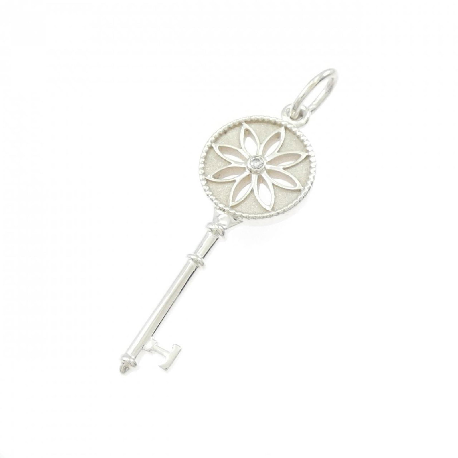 Necklace Tiffany Daisy Key Small: Necklace Tiffany Daisy Key Small A delicate and elegant Tiffany Daisy Key necklace, crafted from sterling silver 925, shines with a sparkling diamond pendant that adds a touch of sophistication to any