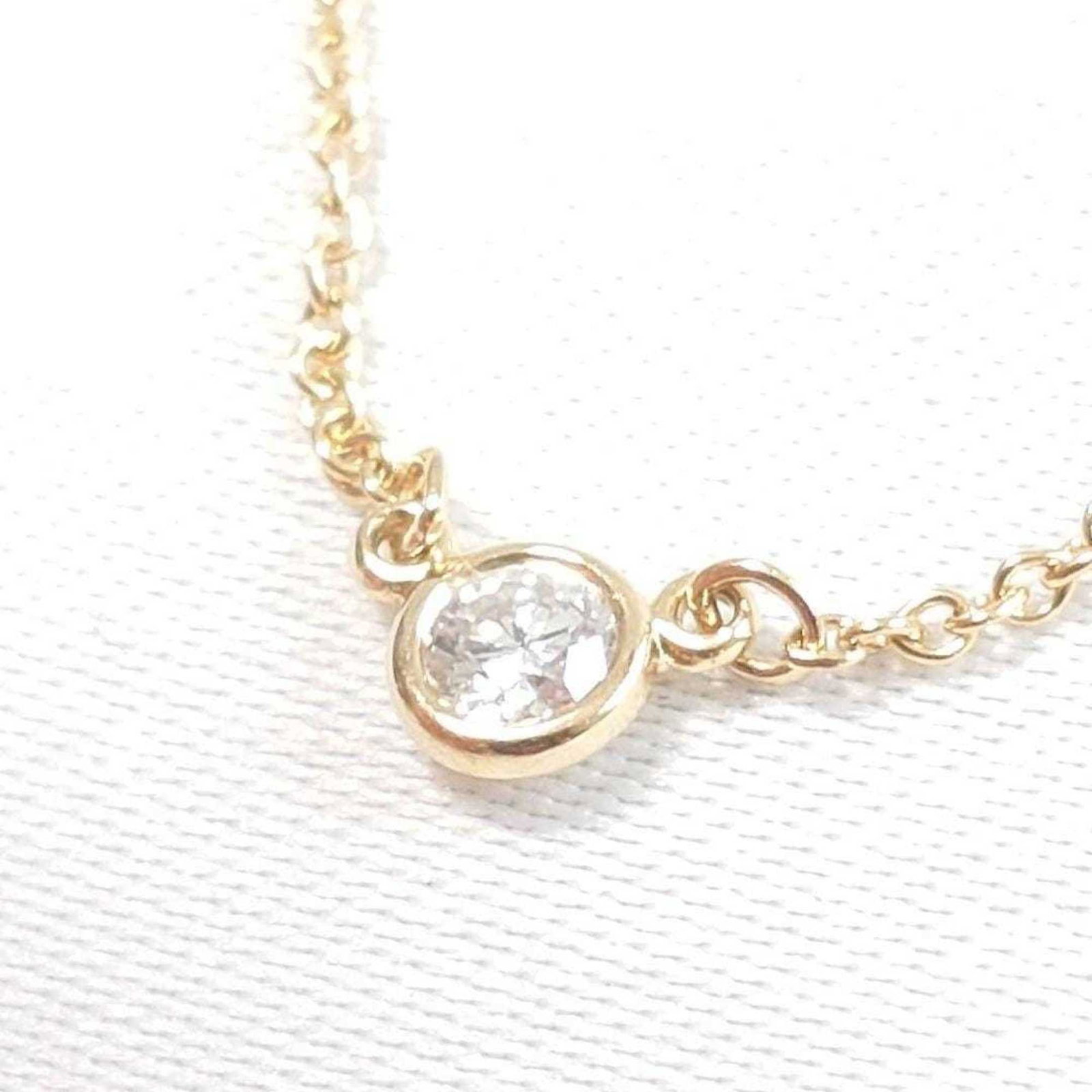 Tiffany & Co. 18k Diamond Necklace by the Yard: Tiffany & Co. 18k Diamond Necklace by the Yard A rare find for the discerning collector, this 18k Tiffany & Co. necklace boasts a stunning yellow diamond set in a timeless design. Weighing in at just